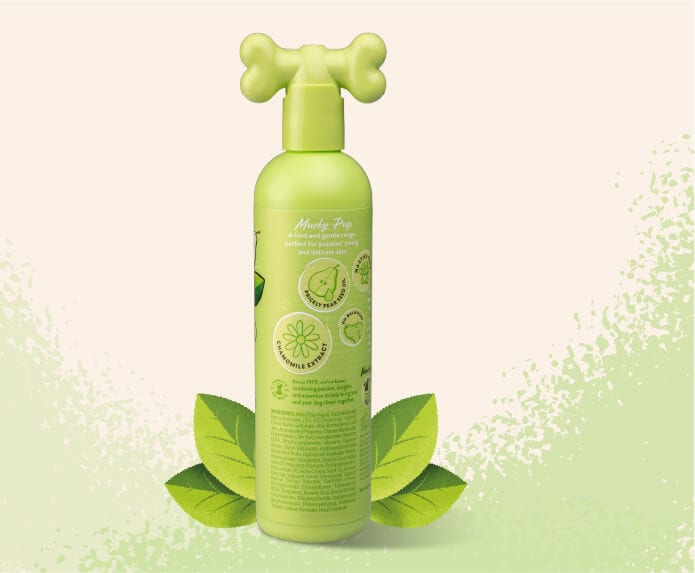 Pet Head Mucky Pup Puppy Shampoo – lifestyle shot with puppy