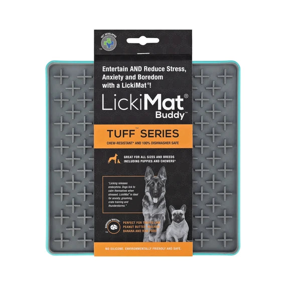 LickiMat Buddy Tuff Turquoise with dog licking