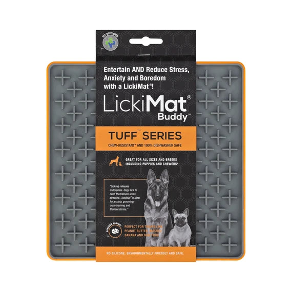 LickiMat Buddy Tuff Orange with dog licking