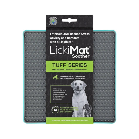 LickiMat Soother Tuff Turquoise with dog licking