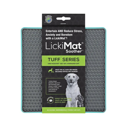 LickiMat Soother Tuff Turquoise with dog licking