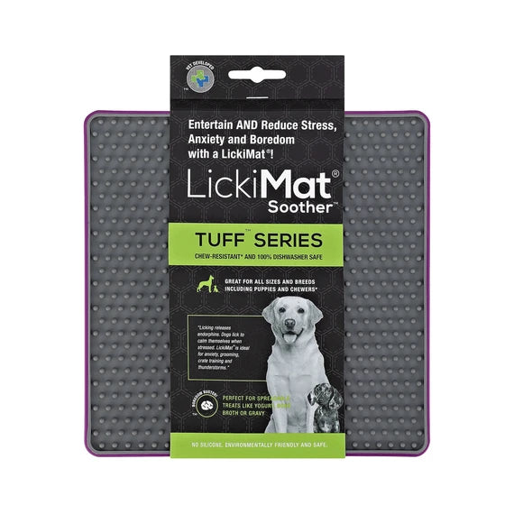 LickiMat Soother Tuff Purple with dog licking
