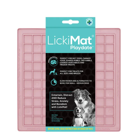 LickiMat Pastel Playdate Guava with dog licking
