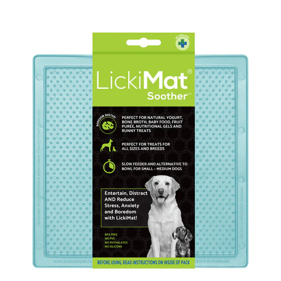 LickiMat Pastel Soother Mint with dog licking