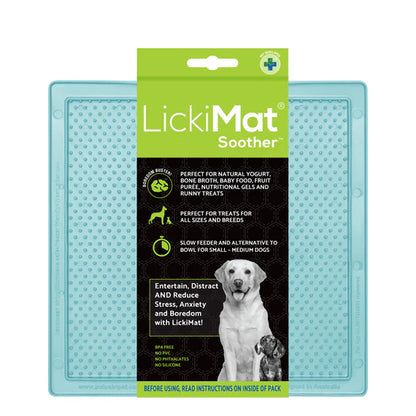 LickiMat Pastel Soother Mint with dog licking