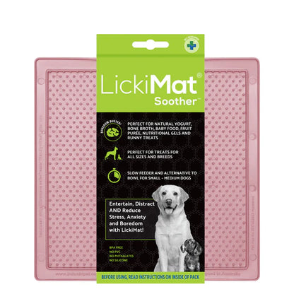 LickiMat Pastel Soother Guava with dog licking