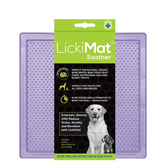LickiMat Pastel Soother Lavender with dog licking