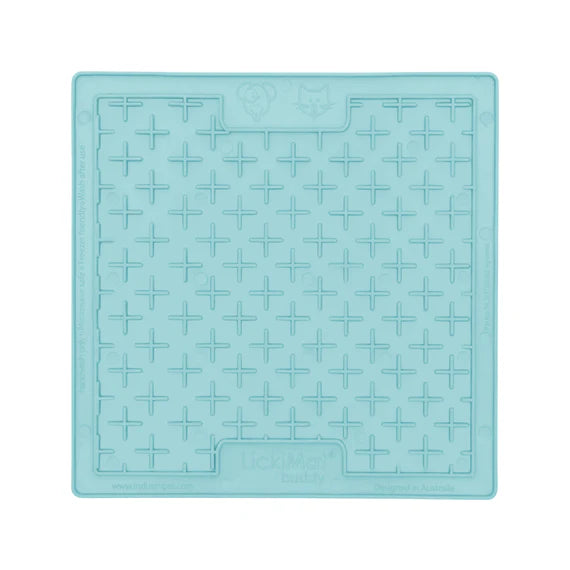LickiMat Pastel Buddy Mint with dog licking