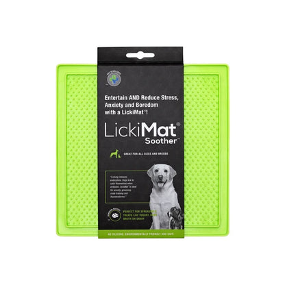 LickiMat Soother Green with dog licking