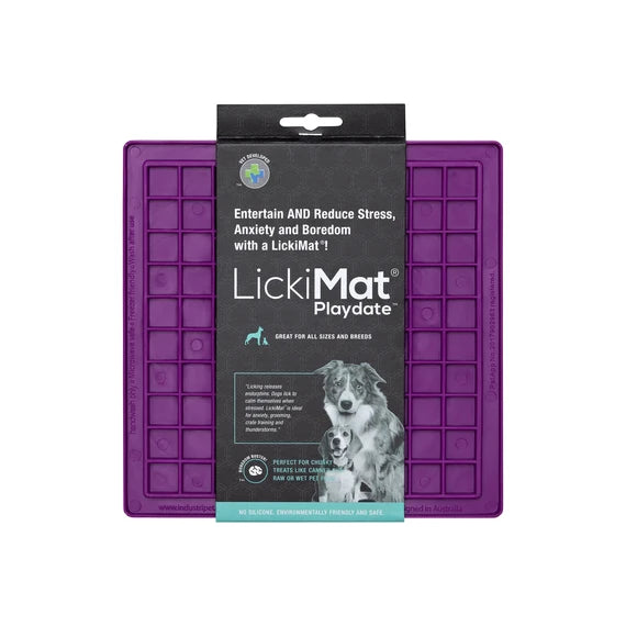LickiMat Playdate Purple with dog licking